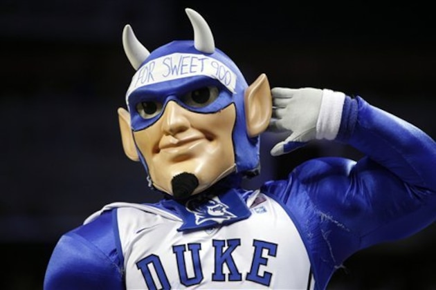 FILE - In this March 20, 2011, file photo, Duke's Blue Devil mascot performs during the first half of a West Regional NCAA tournament third round college basketball game against  in Charlotte, N.C. (AP Photo/Chuck Burton, File)