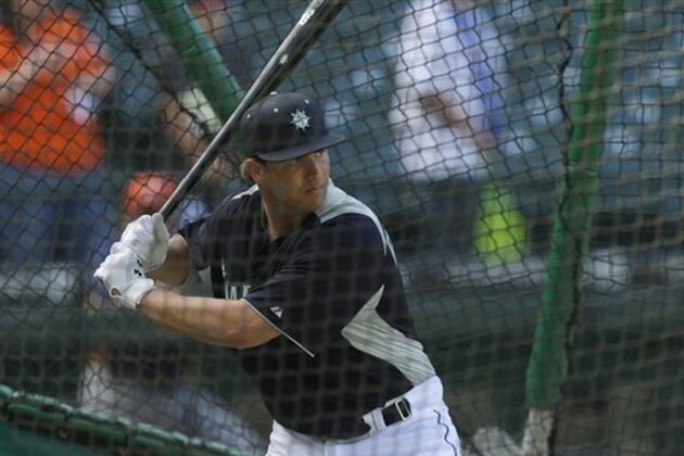 Seattle Mariners top 2013 draft pick, DJ Peterson, takes batting practice before a baseball game against the Houston Astros, Wednesday, June 12, 2013, in Seattle. (AP Photo/Ted S. Warren)