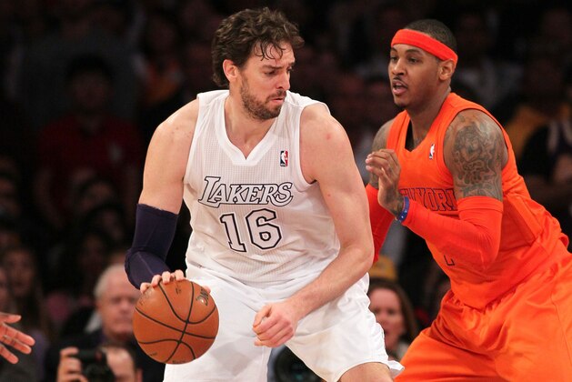 LOS ANGELES, CA - DECEMBER 25: Pau Gasol #16 of the Los Angeles Lakers posts up Carmelo Anthony #7 of the New York Knicks during the NBA game at Staples Center on December 25, 2012 in Los Angeles, California. The Lakers defeated the Knicks 100-94. NOTE TO USER: User expressly acknowledges and agrees that, by downloading and or using this photograph, User is consenting to the terms and conditions of the Getty Images License Agreement. (Photo by Victor Decolongon/Getty Images) LOS ANGELES, CA - DECEMBER 25: Pau Gasol #16 of the Los Angeles Lakers posts up Carmelo Anthony #7 of the New York Knicks during the NBA game at Staples Center on December 25, 2012 in Los Angeles, California. The Lakers defeated the Knicks 100-94. NOTE TO USER: User expressly acknowledges and agrees that, by downloading and or using this photograph, User is consenting to the terms and conditions of the Getty Images License Agreement. (Photo by Victor Decolongon/Getty Images)