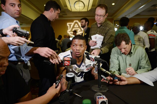 NEWPORT BEACH, CA - JANUARY 4:  Quarterback Nick Marshall #14 of the Auburn Tigers speaks during a Vizio BCS National Championship media day news conference January 4, 2014 in Newport Beach, California.  (Photo by Kevork Djansezian/Getty Images)