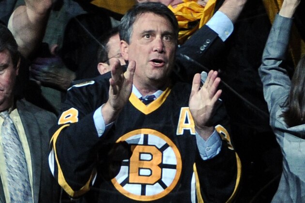BOSTON, MA - JUNE 06:  Former Bruins player Cam Neely cheers during Game Three between the Boston Bruins and the Vancouver Canucks in the 2011 NHL Stanley Cup Final at TD Garden on June 6, 2011 in Boston, Massachusetts.  (Photo by Harry How/Getty Images)