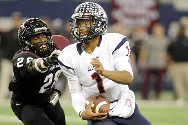 Allen quarterback Kyler Murray (1) runs upfield past Pearland Marlon Walls (28) in the first half during a UIL Class 5A Division I high school football championship game on Saturday Dec. 21, 2013, in Arlington, Texas. (AP Photo/Matt Strasen)