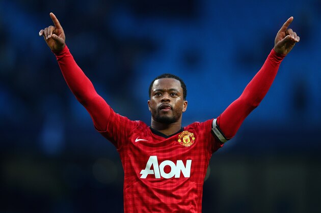 MANCHESTER, ENGLAND - DECEMBER 09:  Patrice Evra of Manchester United celebrates at the end of the Barclays Premier League match between Manchester City and Manchester United at Etihad Stadium on December 9, 2012 in Manchester, England.  (Photo by Clive Mason/Getty Images)
