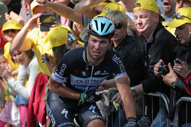 HARROGATE, ENGLAND - JULY 05:  Mark Cavendish of Isle of Man and the Omega Pharma - Quick-Step Cycling Team arrives at the finish line after crashing nearly 200 meters from the finish of stage one of the 2014 Tour de France from Leeds to Harrogate on July 5, 2014 in Harrogate, United Kingdom.  (Photo by Doug Pensinger/Getty Images)