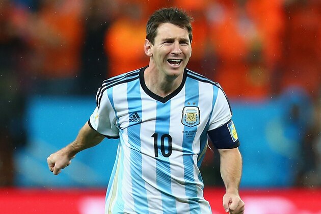 SAO PAULO, BRAZIL - JULY 09:  Lionel Messi of Argentina celebrates defeating the Netherlands in a shootout during the 2014 FIFA World Cup Brazil Semi Final match between the Netherlands and Argentina at Arena de Sao Paulo on July 9, 2014 in Sao Paulo, Brazil.  (Photo by Ronald Martinez/Getty Images)