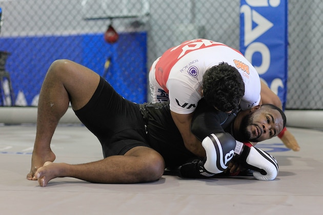 DELRAY BEACH, FL - SEPTEMBER 17: Vitor Belfort (top) trains with Rashad Evans at the Jaco Hybrid Training Center on September 17, 2012 in Delray Beach, Florida. Belfort will fight Jon Jones on September 22, 2012 at UFC 152 in Toronto, Canada.  (Photo by Chris Trotman/Getty Images)