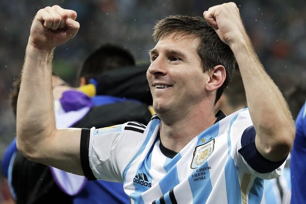 Argentina's Lionel Messi pumps his fists after Argentina defeated the Netherlands 4-2 in a penalty shootout after a 0-0 tie after extra time to advance to the finals after the World Cup semifinal soccer match between the Netherlands and Argentina at the Itaquerao Stadium in Sao Paulo Brazil, Wednesday, July 9, 2014. (AP Photo/Victor R. Caivano)