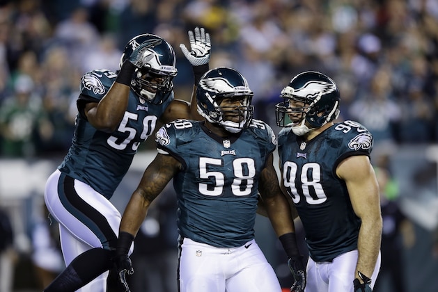 Philadelphia Eagles' Trent Cole (58), DeMeco Ryans (59) and Connor Barwin (98) is seen during an NFL football game against the Chicago Bears, Sunday, Dec. 22, 2013, in Philadelphia. (AP Photo/Michael Perez)