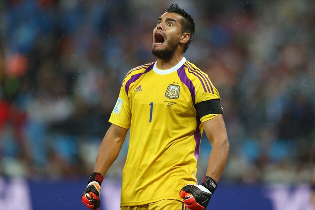 SAO PAULO, BRAZIL - JULY 09:  Sergio Romero of Argentina reacts after saving the penalty kick of Wesley Sneijder of the Netherlands (not pictured) in a shootout during the 2014 FIFA World Cup Brazil Semi Final match between the Netherlands and Argentina at Arena de Sao Paulo on July 9, 2014 in Sao Paulo, Brazil.  (Photo by Ronald Martinez/Getty Images)