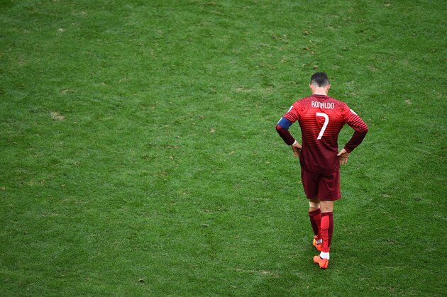 BRASILIA, BRAZIL - JUNE 26:  Cristiano Ronaldo of Portugal looks dejectec after the 2014 FIFA World Cup Brazil Group G match between Portugal and Ghana at Estadio Nacional on June 26, 2014 in Brasilia, Brazil.  (Photo by Christopher Lee/Getty Images)
