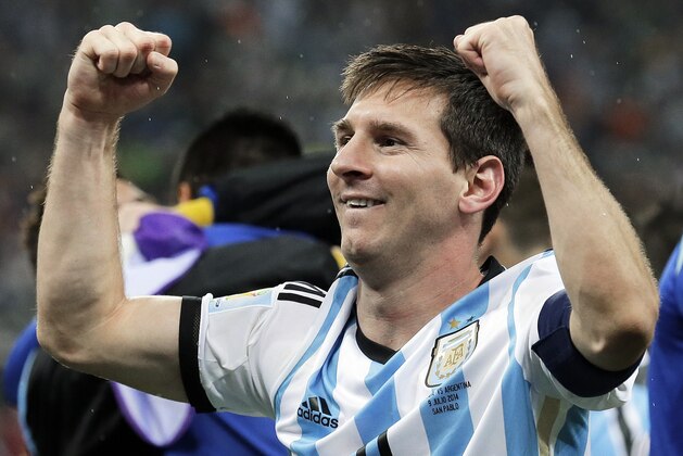 Argentina's Lionel Messi pumps his fists after Argentina defeated the Netherlands 4-2 in a penalty shootout after a 0-0 tie after extra time to advance to the finals after the World Cup semifinal soccer match between the Netherlands and Argentina at the Itaquerao Stadium in Sao Paulo Brazil, Wednesday, July 9, 2014. (AP Photo/Victor R. Caivano)