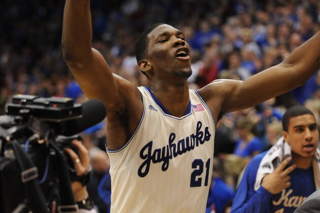 Feb 24, 2014; Lawrence, KS, USA; Kansas Jayhawks center Joel Embiid (21) celebrates after the game against the Oklahoma Sooners at Allen Fieldhouse. Kansas won 83-75. Mandatory Credit: Denny Medley-USA TODAY Sports