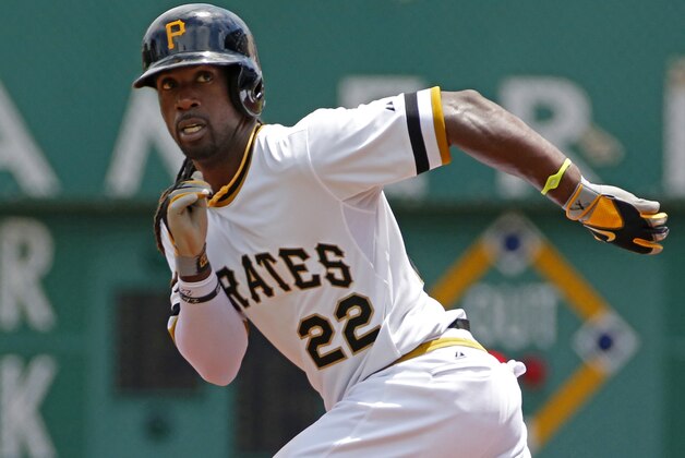 Pittsburgh Pirates' Andrew McCutchen (22) breaks from first during a baseball game against the Philadelphia Phillies in Pittsburgh Sunday, July 6, 2014. The Pirates won 6-2. (AP Photo/Gene J. Puskar)