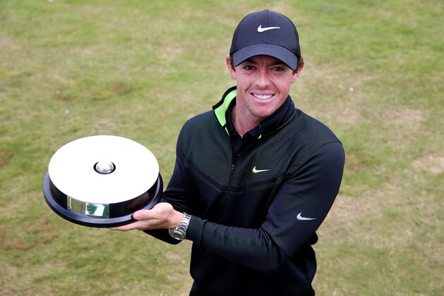 ABERDEEN, SCOTLAND - JULY 10:  Rory McIlroy of Northern Ireland poses with the European Tour Shot of the Month award for May during the first round of the Aberdeen Asset Management Scottish Open at Royal Aberdeen on July 10, 2014 in Aberdeen, Scotland.  (Photo by Andrew Redington/Getty Images)