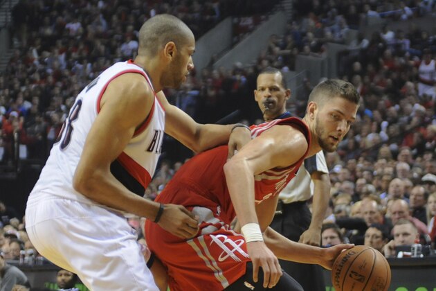 Portland Trail Blazers' Nicolas Batum (88) defends against Houston Rockets' Chandler Parsons (25) during game four of an NBA basketball first-round playoff series game in Portland, Ore., Sunday April 27, 2014. (AP Photo/Greg Wahl-Stephens)