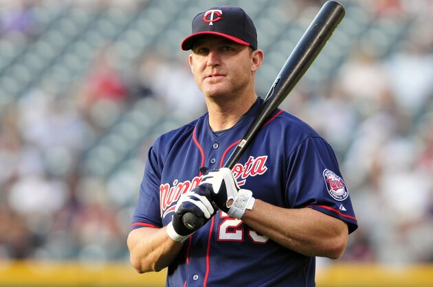 CLEVELAND, OH - AUGUST 12: Designated hitter Jim Thome #25 of the Minnesota Twins warms up prior to the game against the Cleveland Indians at Progressive Field on August 12, 2011 in Cleveland, Ohio. (Photo by Jason Miller/Getty Images)