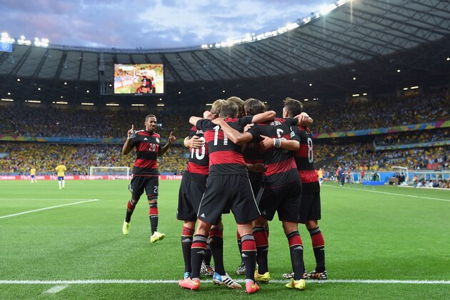 BELO HORIZONTE, BRAZIL - JULY 08: Toni Kroos of Germany celebrates scoring his team's fourth goal with his team-mates during the 2014 FIFA World Cup Brazil Semi Final match between Brazil and Germany at Estadio Mineirao on July 8, 2014 in Belo Horizonte, Brazil.  (Photo by Buda Mendes/Getty Images)