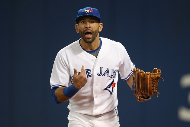 TORONTO, CANADA - JUNE 6: Jose Bautista #19 of the Toronto Blue Jays voices a complaint with the umpire after a fan interfered with his pursuit of a foul fly ball in the ninth inning during MLB game action against the St. Louis Cardinals on June 6, 2014 at Rogers Centre in Toronto, Ontario, Canada. (Photo by Tom Szczerbowski/Getty Images)