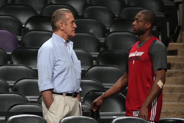 SAN ANTONIO, TX - JUNE 12: Pat Riley, Team President of the Miami Heat and Dwyane Wade view practice as part of the 2013 NBA Finals on June 12, 2013 at AT&T Center in San Antonio, Texas. NOTE TO USER: User expressly acknowledges and agrees that, by downloading and or using this photograph, User is consenting to the terms and conditions of the Getty Images License Agreement. Mandatory Copyright Notice: Copyright 2013 NBAE (Photo by Joe Murphy/NBAE via Getty Images)