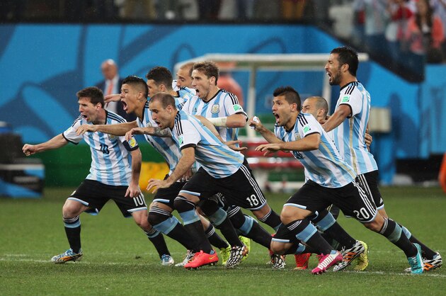 SAO PAULO, BRAZIL - JULY 09:  Lionel Messi, Pablo Zabaleta, Martin Demichelis, Marcos Rojo, Lucas Biglia, Javier Mascherano, Rodrigo Palacio, Ezequiel Garay and Sergio Aguero of Argentina celebrate defeating the Netherlands in a penalty shootout during the 2014 FIFA World Cup Brazil Semi Final match between the Netherlands and Argentina at Arena de Sao Paulo on July 9, 2014 in Sao Paulo, Brazil.  (Photo by Dean Mouhtaropoulos/Getty Images)