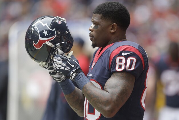 Houston Texans wide receiver Andre Johnson (80) walks the sidelines during the first quarter of an NFL football game against the Denver Broncos, Sunday, Dec. 22, 2013, in Houston. (AP Photo/Patric Schneider)