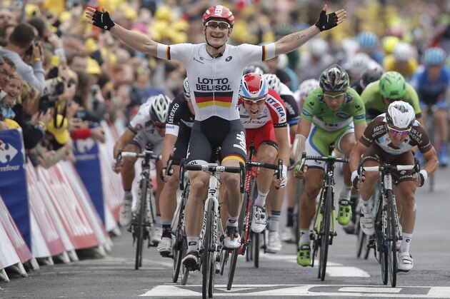 Germany's Andre Greipel, center, crosses the finish line ahead of second place Norway's Alexander Kristoff, center in red and white, third place Samuel Dumoulin of France, right, and Peter Sagan of Slovakia, second right and fifth place, to win the sixth stage of the Tour de France cycling race over 194 kilometers (120.5 miles) with start in Arras and finish in Reims, France, Thursday, July 10, 2014. (AP Photo/Peter Dejong) Germany's Andre Greipel, center, crosses the finish line ahead of second place Norway's Alexander Kristoff, center in red and white, third place Samuel Dumoulin of France, right, and Peter Sagan of Slovakia, second right and fifth place, to win the sixth stage of the Tour de France cycling race over 194 kilometers (120.5 miles) with start in Arras and finish in Reims, France, Thursday, July 10, 2014. (AP Photo/Peter Dejong)