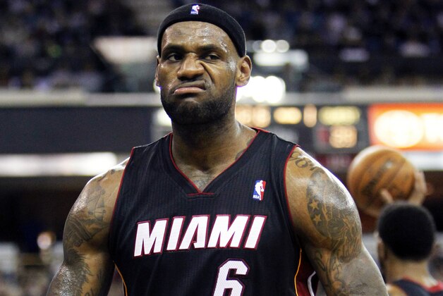 FILE - In this Dec. 27, 2013 file photo, Miami Heat forward LeBron James reacts after scoring and drawing a foul against the Sacramento Kings during the first half of an NBA basketball game, in Sacramento, Calif. The wait continues for the next decision. At stake for LeBron James: Where he plays for the next few seasons, and which fan base _ the already-scorned one in Cleveland or the panicked one in Miami _ will undoubtedly feel alienated by whatever choice his latest foray into free agency leads him to make. (AP Photo/Steve Yeater, File) FILE - In this Dec. 27, 2013 file photo, Miami Heat forward LeBron James reacts after scoring and drawing a foul against the Sacramento Kings during the first half of an NBA basketball game, in Sacramento, Calif. The wait continues for the next decision. At stake for LeBron James: Where he plays for the next few seasons, and which fan base _ the already-scorned one in Cleveland or the panicked one in Miami _ will undoubtedly feel alienated by whatever choice his latest foray into free agency leads him to make. (AP Photo/Steve Yeater, File)