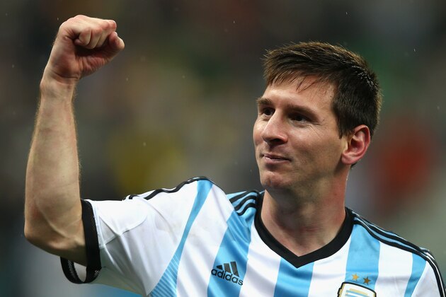 SAO PAULO, BRAZIL - JULY 09:  Lionel Messi of Argentina celebrates defeating the Netherlands in a shootout during the 2014 FIFA World Cup Brazil Semi Final match between the Netherlands and Argentina at Arena de Sao Paulo on July 9, 2014 in Sao Paulo, Brazil.  (Photo by Clive Rose/Getty Images)