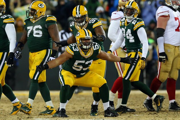 GREEN BAY, WI - JANUARY 05:  Nick Perry #53 of the Green Bay Packers celebrates after sacking Colin Kaepernick #7 of the San Francisco 49ers in the third quarter on 3rd and 5 during their NFC Wild Card Playoff game at Lambeau Field on January 5, 2014 in Green Bay, Wisconsin.  (Photo by Ronald Martinez/Getty Images)