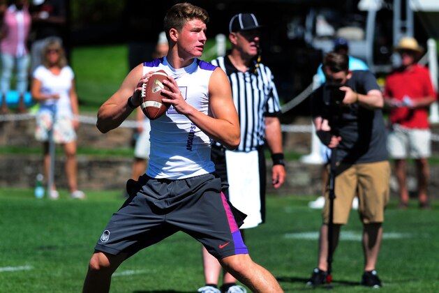 Jul 10, 2014; Beaverton, OR, USA; Apocalypse quarterback Blake Barnett (12) passes the ball during Nike Football ' The Opening' at Nike World Headquarters.  Mandatory Credit: Steve Dykes-USA TODAY Sports