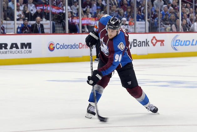 Colorado Avalanche center Ryan O'Reilly (90) shoots a goal against the Minnesota Wild during the second period in Game 1 of an NHL hockey first-round playoff series on Thursday, April 17, 2014, in Denver. (AP Photo/Jack Dempsey)
