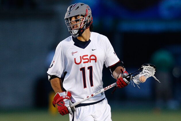 BOSTON, MA - JUNE 26: Paul Rabil #11 of Team USA competes against Team MLL in the fourth quarter during the 2014 MLL All Star Game at Harvard Stadium on June 26, 2014 in Boston, Massachusetts.  (Photo by Jim Rogash/Getty Images)