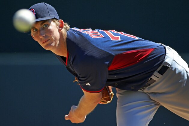 Boston Red Sox starting pitcher Henry Owens (76) warms up before the first inning of an exhibition spring training baseball game against the Baltimore Orioles in Sarasota, Fla.,Saturday, March 8, 2014. (AP Photo/Gene J. Puskar)