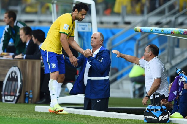 BELO HORIZONTE, BRAZIL - JULY 08: Fred of Brazil greets thir head coach Luiz Felipe Scolari after being substituted during the 2014 FIFA World Cup Brazil Semi Final match between Brazil and Germany at Estadio Mineirao on July 8, 2014 in Belo Horizonte, Brazil.  (Photo by Buda Mendes/Getty Images)