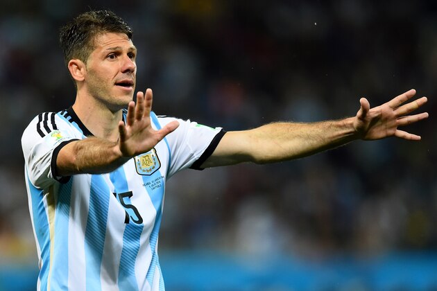 SAO PAULO, BRAZIL - JULY 09: Martin Demichelis of Argentina reacts during the 2014 FIFA World Cup Brazil Semi Final match between the Netherlands and Argentina at Arena de Sao Paulo on July 9, 2014 in Sao Paulo, Brazil.  (Photo by Matthias Hangst/Getty Images)