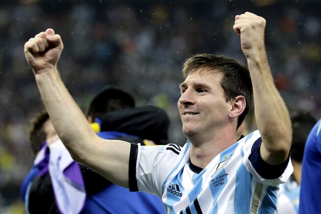 Argentina's Lionel Messi celebrates after Argentina defeated the Netherlands 4-2 in a penalty shootout after a 0-0 tie after extra time to advance to the finals during the World Cup semifinal soccer match between the Netherlands and Argentina at the Itaquerao Stadium in Sao Paulo Brazil, Wednesday, July 9, 2014. (AP Photo/Victor R. Caivano)
