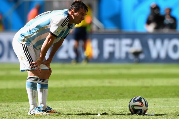 BRASILIA, DF - JULY 05:  Lionel Messi of Argentina looks on before taking a free kick during the 2014 FIFA World Cup Brazil Quarter Final match between Argentina and Belgium at Estadio Nacional on July 5, 2014 in Brasilia, Brazil.  (Photo by Matthias Hangst/Getty Images)