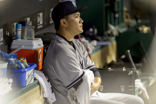 CLEVELAND, OH - JULY 8: Starting pitcher Masahiro Tanaka #19 of the New York Yankees sits in the dugout after leaving the game during the seventh inning against the Cleveland Indians at Progressive Field on July 8, 2014 in Cleveland, Ohio.  (Photo by Jason Miller/Getty Images)