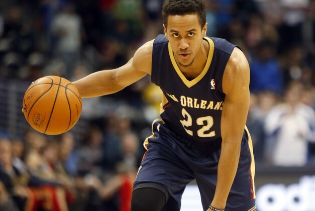 Apr 2, 2014; Denver, CO, USA; New Orleans Pelicans guard Brian Roberts (22) with the ball during the first half against the Denver Nuggets at Pepsi Center. Mandatory Credit: Chris Humphreys-USA TODAY Sports