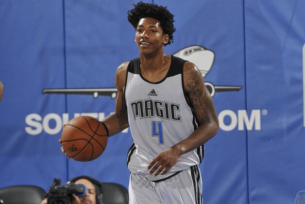 ORLANDO, FL - JULY 10: Elfrid Payton #4 of the Orlando Magic dribbles the ball against the Boston Celtics during the game on July 10, 2014 at Amway Center in Orlando, Florida. NOTE TO USER: User expressly acknowledges and agrees that, by downloading and or using this photograph, User is consenting to the terms and conditions of the Getty Images License Agreement. Mandatory Copyright Notice: Copyright 2014 NBAE (Photo by Fernando Medina/NBAE via Getty Images) ORLANDO, FL - JULY 10: Elfrid Payton #4 of the Orlando Magic dribbles the ball against the Boston Celtics during the game on July 10, 2014 at Amway Center in Orlando, Florida. NOTE TO USER: User expressly acknowledges and agrees that, by downloading and or using this photograph, User is consenting to the terms and conditions of the Getty Images License Agreement. Mandatory Copyright Notice: Copyright 2014 NBAE (Photo by Fernando Medina/NBAE via Getty Images)