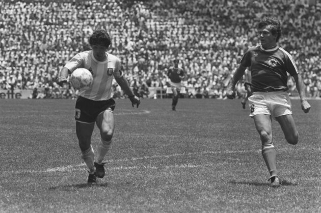Argentinian player Maradona, left, challenges German midfielder Lothar Matthaeus during the World Cup Final Germany versus Argentina in Mexico City, Sunday, June 29, 1986. Argentinia defeated West Germany 3-2 and won the Jules Rimet Trophy. (AP-PHOTO/mw/stf)