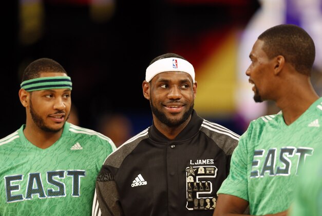 Feb 16, 2014; New Orleans, LA, USA; Eastern Conference forward Carmelo Anthony (7) of the New York Knicks,  forward LeBron James (6) of the Miami Heat and forward Chris Bosh (1) of the Miami Heat talk before the 2014 NBA All-Star Game at the Smoothie King Center. Mandatory Credit: Derick E. Hingle-USA TODAY Sports