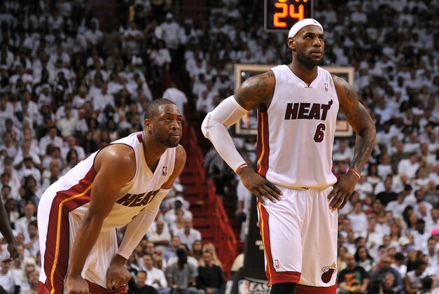 May 24, 2014; Miami, FL, USA; Miami Heat forward LeBron James (right) and Miami Heat guard Dwyane Wade (3) both take a breather during a game against the Miami Heat in game three of the Eastern Conference Finals of the 2014 NBA Playoffs at American Airlines Arena. Mandatory Credit: Steve Mitchell-USA TODAY Sports