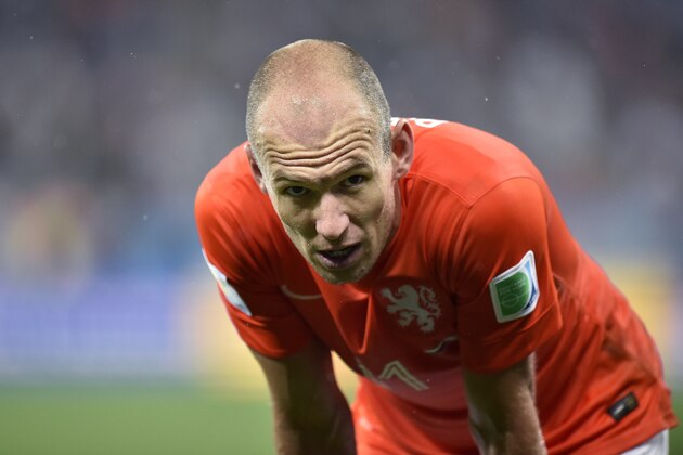 Netherlands' Arjen Robben pauses before the start of extra time during the World Cup semifinal soccer match between the Netherlands and Argentina at the Itaquerao Stadium in Sao Paulo Brazil, Wednesday, July 9, 2014. (AP Photo/Martin Meissner)