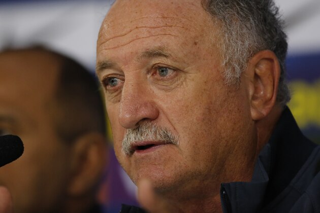 Brazil's coach Luiz Felipe Scolari answers questions during a press conference at the Granja Comary training center in Teresopolis, Brazil, Wednesday, July 9, 2014. Brazilians woke up this morning to dreadful headlines describing their soccer team's historic defeat of 7-1 to Germany in the World Cup's semifinal. (AP Photo/Leo Correa) Brazil's coach Luiz Felipe Scolari answers questions during a press conference at the Granja Comary training center in Teresopolis, Brazil, Wednesday, July 9, 2014. Brazilians woke up this morning to dreadful headlines describing their soccer team's historic defeat of 7-1 to Germany in the World Cup's semifinal. (AP Photo/Leo Correa)