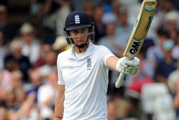 England's Joe Root celebrates after scoring a half century during day three of the first Test between England and India at Trent Bridge cricket ground, Nottingham, England, Friday, July 11, 2014. (AP Photo/Rui Vieira)
