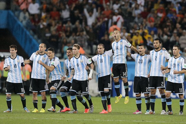 Argentine players react during a penalty shoot-out in the World Cup semifinal soccer match between the Netherlands and Argentina at the Itaquerao Stadium in Sao Paulo Brazil, Wednesday, July 9, 2014. Argentina defeated the Netherlands 4-2 in a penalty shootout after a 0-0 tie after extra time to advance to the finals against Germany. (AP Photo/Victor R. Caivano) Argentine players react during a penalty shoot-out in the World Cup semifinal soccer match between the Netherlands and Argentina at the Itaquerao Stadium in Sao Paulo Brazil, Wednesday, July 9, 2014. Argentina defeated the Netherlands 4-2 in a penalty shootout after a 0-0 tie after extra time to advance to the finals against Germany. (AP Photo/Victor R. Caivano)