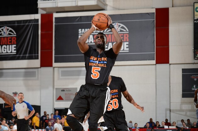 LAS VEGAS, NV - JULY 11: Tim Hardaway Jr. #5 of the New York Knicks shoots the ball against the Dallas Mavericks during the game on July 11, 2014 at Cox Pavilion in Las Vegas, Nevada. NOTE TO USER: User expressly acknowledges and agrees that, by downloading and or using this photograph, User is consenting to the terms and conditions of the Getty Images License Agreement. Mandatory Copyright Notice: Copyright 2014 NBAE  (Photo by Garrett Ellwood/NBAE via Getty Images)