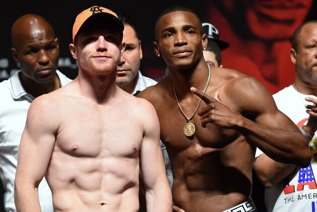 LAS VEGAS, NV - JULY 11:  Boxers Canelo Alvarez (L) and Erislandy Lara pose during their official weigh-in at the MGM Grand Garden Arena on July 11, 2014 in Las Vegas, Nevada. The two will meet in a non-title bout on July 12.  (Photo by Ethan Miller/Getty Images)
