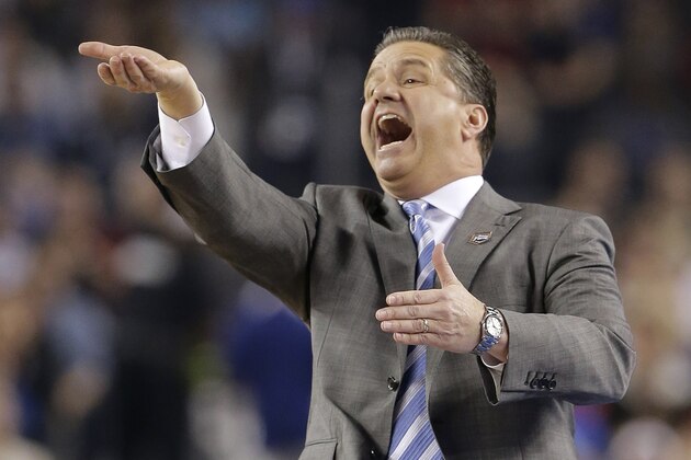 Kentucky head coach John Calipari reacts during the first half of an NCAA Final Four tournament college basketball semifinal game against Wisconsin Saturday, April 5, 2014, in Arlington, Texas. (AP Photo/Eric Gay)